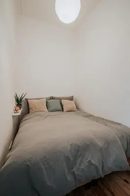Ein Bett oder Betten in einem Zimmer der Unterkunft Gaudyhouse
