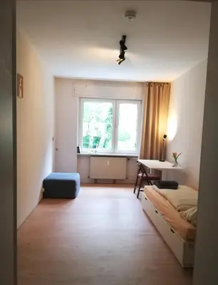 Ein Bett oder Betten in einem Zimmer der Unterkunft Dein Zimmer bei der Spree