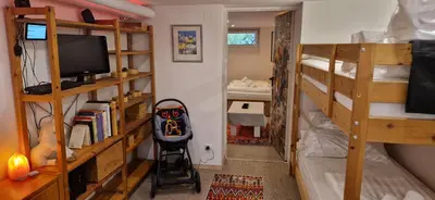 Ein Bett oder Betten in einem Zimmer der Unterkunft Kreuzberg Zentral - 7 Betten bis 11 Personen - Genial für große Gruppen