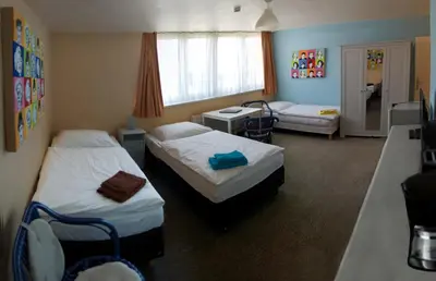 Ein Bett oder Betten in einem Zimmer der Unterkunft Apartmentpension Am Krongut