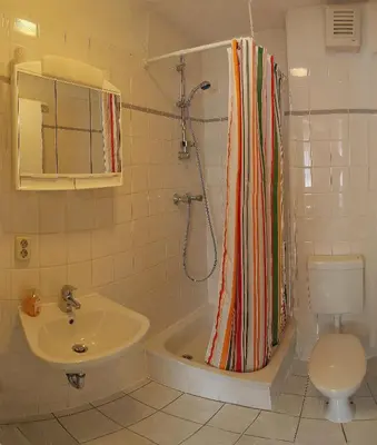 Ein Badezimmer in der Unterkunft Apartmentpension Am Krongut