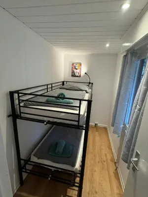 Ein Bett oder Betten in einem Zimmer der Unterkunft Feriendorf Seddiner See - Bungalow 8