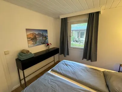 Ein Bett oder Betten in einem Zimmer der Unterkunft Feriendorf Seddiner See - Bungalow 8