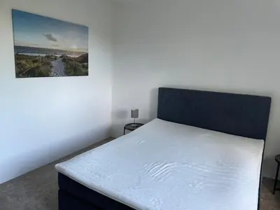 Ein Bett oder Betten in einem Zimmer der Unterkunft Gemütliche 2-Zimmerwohnung
