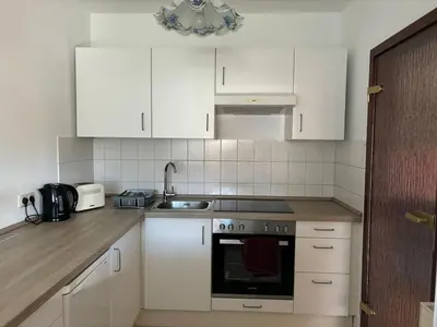 Küche/Küchenzeile in der Unterkunft Gemütliche 2-Zimmerwohnung