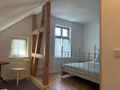 Ein Bett oder Betten in einem Zimmer der Unterkunft Forsthaus Barsdorf