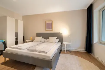 Ein Bett oder Betten in einem Zimmer der Unterkunft Cosy Remise Apartment Berlin Reinickendorf