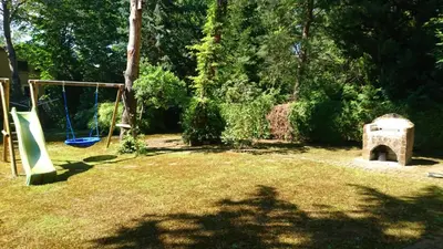 Ein Garten an der Unterkunft Ferienhaus Eichwalde