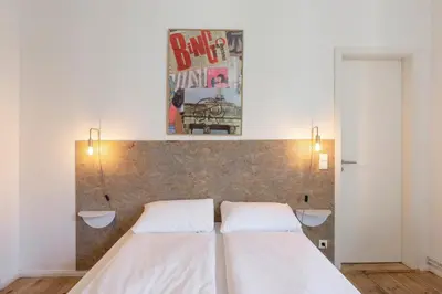Ein Bett oder Betten in einem Zimmer der Unterkunft Mooeve Boxi Big Apartments