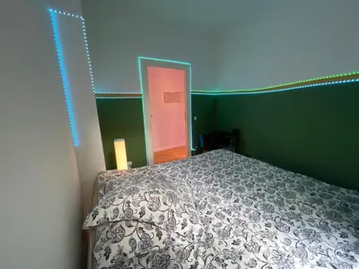 Ein Bett oder Betten in einem Zimmer der Unterkunft The Cozy Green