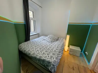 Ein Bett oder Betten in einem Zimmer der Unterkunft The Cozy Green