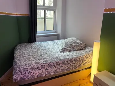 Ein Bett oder Betten in einem Zimmer der Unterkunft The Cozy Green
