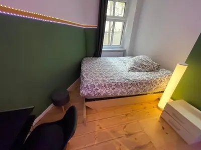 Ein Bett oder Betten in einem Zimmer der Unterkunft The Cozy Green