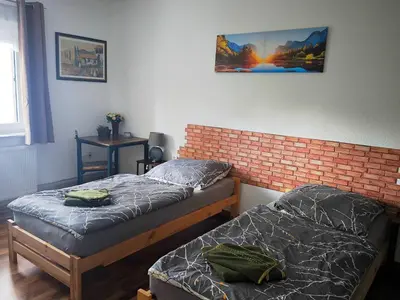 Ein Bett oder Betten in einem Zimmer der Unterkunft Ferienwohnung im Grünen Senzig