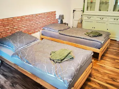 Ein Bett oder Betten in einem Zimmer der Unterkunft Ferienwohnung im Grünen Senzig