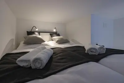 Ein Bett oder Betten in einem Zimmer der Unterkunft Dufte Bude