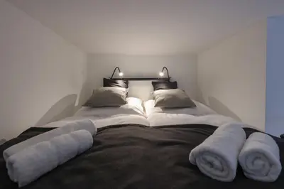 Ein Bett oder Betten in einem Zimmer der Unterkunft Dufte Bude