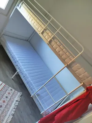 Ein Bett oder Betten in einem Zimmer der Unterkunft Rotes Haus