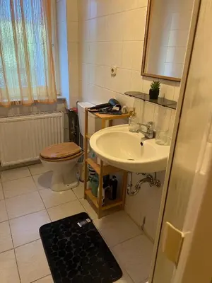 Ein Badezimmer in der Unterkunft Light-flooded 3-room apartment with balcony