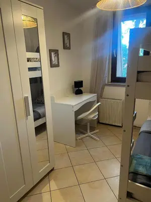 Ein Bett oder Betten in einem Zimmer der Unterkunft Light-flooded 3-room apartment with balcony