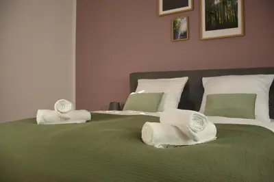 Ein Bett oder Betten in einem Zimmer der Unterkunft Maisonette-Apartment für bis zu 6 Personen - Parkplatz - WLAN - Kingsize