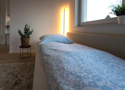 Ein Bett oder Betten in einem Zimmer der Unterkunft Stilvolle & zentrale Ferienwohnung in Oranienburg