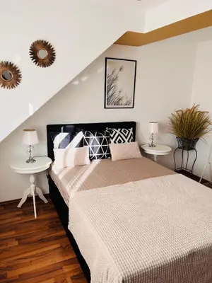 Ein Bett oder Betten in einem Zimmer der Unterkunft Zapfwerk-Rooms
