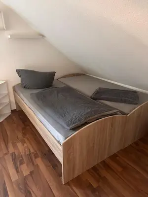 Ein Bett oder Betten in einem Zimmer der Unterkunft Zapfwerk-Rooms