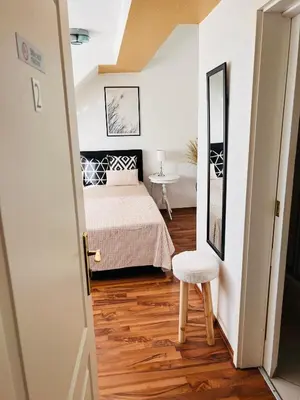 Ein Bett oder Betten in einem Zimmer der Unterkunft Zapfwerk-Rooms