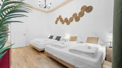Ein Bett oder Betten in einem Zimmer der Unterkunft Design Apartment in Prenzlauer Berg - 79 QM