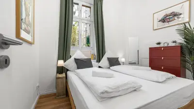 Ein Bett oder Betten in einem Zimmer der Unterkunft Design Apartment in Prenzlauer Berg - 79 QM