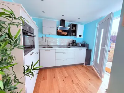 Küche/Küchenzeile in der Unterkunft Ferienhaus Sanibel mit Kaminofen