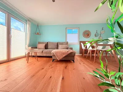 Ein Sitzbereich in der Unterkunft Ferienhaus Sanibel mit Kaminofen