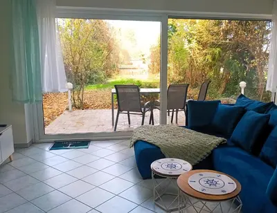 Ein Sitzbereich in der Unterkunft Ferienhaus - Ankerplatz am Werlsee, mit eigenem Bootssteg und Sauna