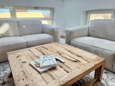 Ein Sitzbereich in der Unterkunft HolidayHome Apartments|Luxury Loft-Style Apartment