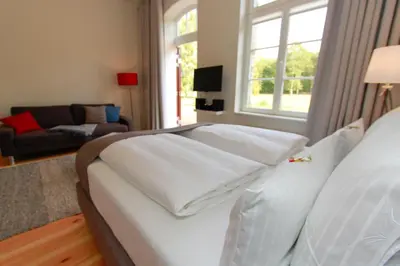 Ein Bett oder Betten in einem Zimmer der Unterkunft Ferienwohnungen Bahnhof Werder