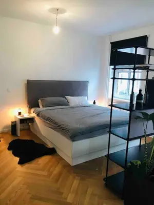 Ein Bett oder Betten in einem Zimmer der Unterkunft Charming Apartment in the Middle of Berlin!