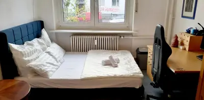 Ein Bett oder Betten in einem Zimmer der Unterkunft Tripplezimmer mit Garten, Kicker und Grill