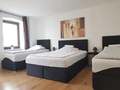 Ein Bett oder Betten in einem Zimmer der Unterkunft top located Apartment