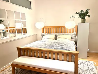 Ein Bett oder Betten in einem Zimmer der Unterkunft Elegantes City-Apartment mit Berliner Flair in Friedenau