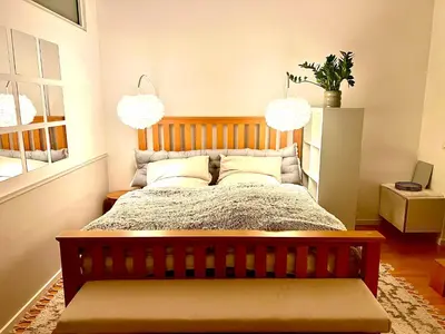 Ein Bett oder Betten in einem Zimmer der Unterkunft Elegantes City-Apartment mit Berliner Flair in Friedenau