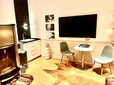 TV/Unterhaltungsangebot in der Unterkunft Elegantes City-Apartment mit Berliner Flair in Friedenau