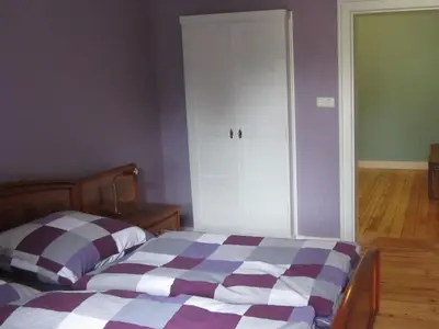 Ein Bett oder Betten in einem Zimmer der Unterkunft Villa Vogelweide