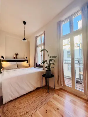 Ein Bett oder Betten in einem Zimmer der Unterkunft Chic Boutique Studio with Balcony in Prenzlauer Berg