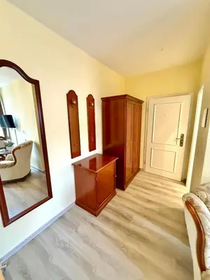 Ein Bett oder Betten in einem Zimmer der Unterkunft Schlösschen am Rhinufer