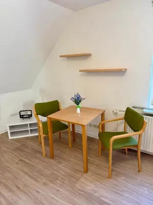 Ein Sitzbereich in der Unterkunft Schlösschen am Rhinufer