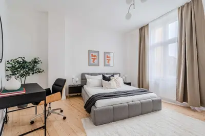 Ein Bett oder Betten in einem Zimmer der Unterkunft Modernes Apartment im Holländischen Viertel