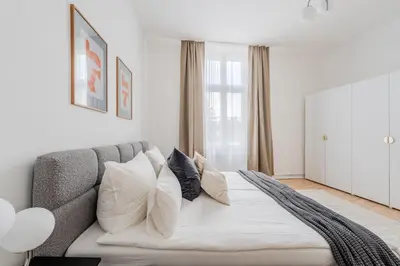 Ein Bett oder Betten in einem Zimmer der Unterkunft Modernes Apartment im Holländischen Viertel