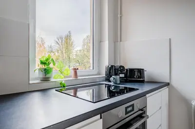 Küche/Küchenzeile in der Unterkunft Modernes Apartment im Holländischen Viertel