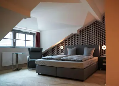 Ein Sitzbereich in der Unterkunft qnorke Hotel